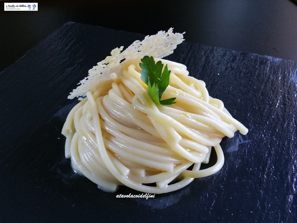 Spaghetti all’olio di olive celline e parmigiano vacche rosse